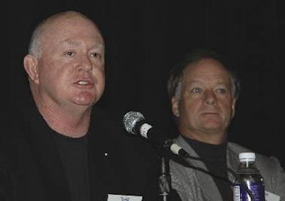 O.B. Goolsby addresses the food media as Jim Perdue looks on.