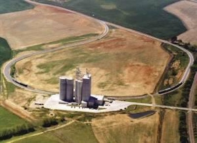 The innovative continuous loop rail spur at Tyson Foods' Talladega feed mill presently handles 65-car unit trains of corn. But Tyson feed milling director Tommy Robertson says the seven-year-old Talladega plant will take advantage of CSX railroad development incentives to take 90-car trains.