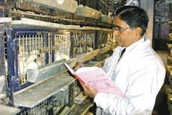 Dr A. K. Sachdev records data at the experimental farm