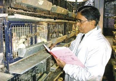 Dr A. K. Sachdev records data at the experimental farm