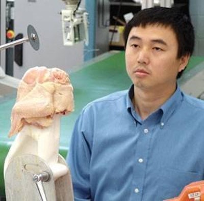 Debao Zhou, post-doctoral fellow, is working on the design of the smart' deboning system that is capable of adapting to internal bird anatomy while compensating for any body deformations
