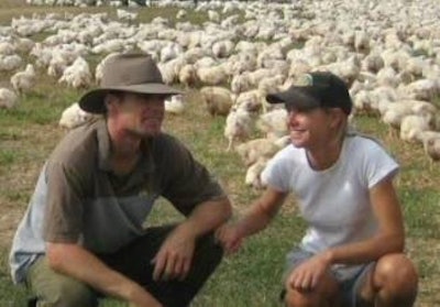 Tom and Narelle Riggall with their flock