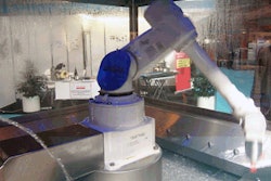 At Meatex in UK, the British distributor for Fanuc of Japan displayed a robotic arm washed constantly by jets of water from each side.