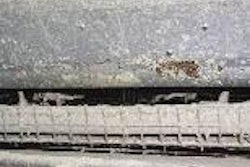 Corrosion damage from cooling pad droplets.