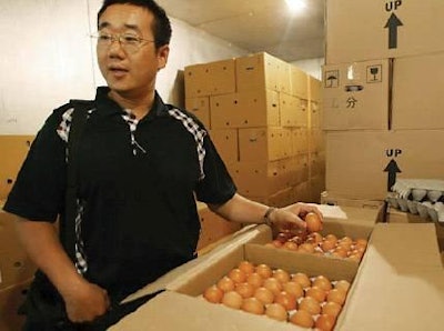 Michael Young, chief executive of Luen Tai Hong wholesalers, with eggs from mainland China he says meet quality standards.