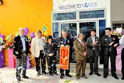 Novus executives and VIP guests receive a confetti of well wishes to mark the official opening of the new Singapore plant.