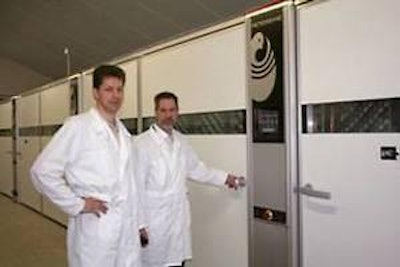 R. Vroegindeweij, hatchery manager, Het Anker, and J. Vroegindeweij, director, Het Anker, in front of the BioStreamer incubators.