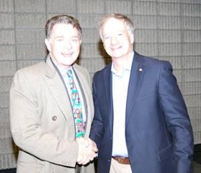 Lee Cockerell (left) was welcomed by Jim Perdue, president and CEO of Perdue Farms, Salisbury, MD.