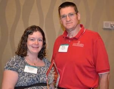 The winner of the 2011 Clean Water Awards for the full treatment category was Perdue Farms, with Melissa Molaison, left, waste systems manager, accepting the award from Dr. Brian Kiepper, University of Georgia, a member of the selection committee.