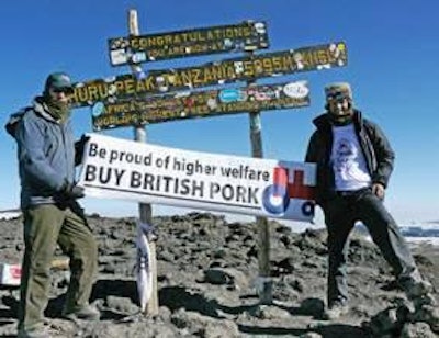 Tom Licence and Martin Millard stand on Mt. Kilimanjaro.