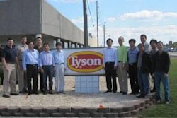 Charles Calvert (far left) and Biao Chen, Cobb China sales manager (far right) stand with senior representatives from Beijing Poultry Breeding Co., Dalian Kailong Food Industry Co., Yonghong Husbandry Co., Liaoning Yinong Animal Husbandry Co., Anhui Hewei Agricultural Development Co. and Hubei Tongxing Agriculture Co.