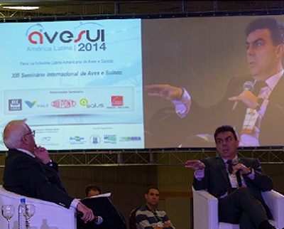 Journalist Joao Batista Olivi, left, interviews Ariovaldo Zani, CEO of Sindiraçoes, the Brazilian Feed Association, at Avesui in Florianopolis, Brazil.