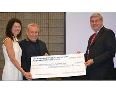Chantal and Tommy Bagwell, chairman and CEO, American Proteins, presenting Elton Maddox, president and CEO, Wayne Farms, and treasurer of the USPOULTRY Foundation, with a $1 million check on behalf of the Leland Bagwell Education and Innovation Fund.