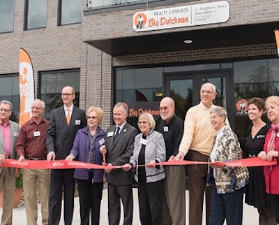Company and community officials participate in a ribbon cutting ceremony for the expansion of Big Dutchman USA's headquarters in Holland, Michigan.