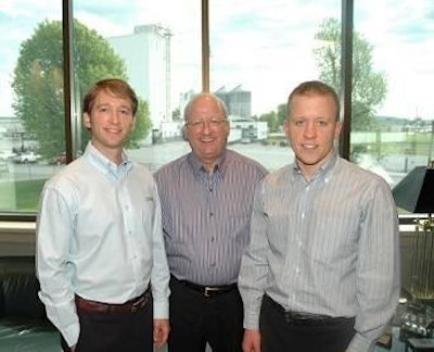 George’s Inc. co-CEOs Carl George, left, and Charles George, right, with their father, Gary George, chairman of the board.
