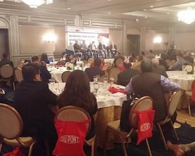Guests at the DuPont roundtable on antibiotic-free chicken production at IPPE 2015 listen as industry expert panelists discuss how demand for this product is changing.