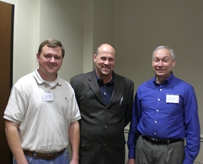 Wes Hall, left, and Joe Steed, right, are welcomed to the North Carolina Poultry Federation board by NCPF President Dan Peugh.