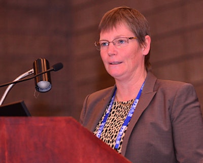 Deborah Perkins, managing director for Rabobank International, speaking at the Market Intelligence Forum held during the 2014 International Production & Processing Expo in Atlanta.