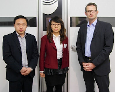 Petersime employees, from left, Liu Haibo, Sandy Qi and André van Rij commemorate the opening of a representative office in Tianjin, China.