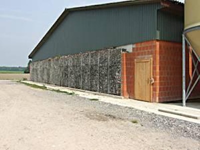 A view of the MagixX wood filter which helps remove pig odours and ammonia from exhaust emissions form pig houses from outside.