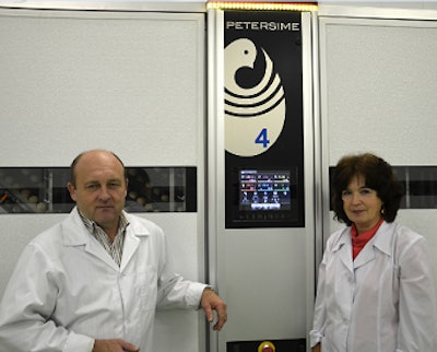 Ptitsefabrika Reftinskaya Hatchery Engineer Valerij Eremejev, left, and Hatchery Manager Svetlana Skopina stand with a new Petersime incubator, which is part of the company's hatchery growth plan.