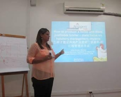 Aline Ferreira Kuntze presents to a group of Chinese customers in Brazil.