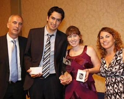 Mirko Botasso and Kirsty Jensen, center, earned top honors from the 50th Aviagen School.