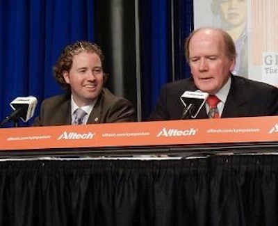 From left, Dr. Mark Lyons, Alltech's vice president of corporate affairs, and Dr. T. Pearse Lyons, Alltech's president and founder, speak at the Alltech Symposium May 20.