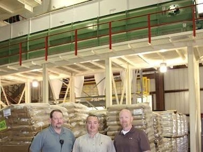 Jackie Roembke | The final stage of Peco Foods’ Newark feed mill expansion included the installation of a new CPM pellet line, which features a 67-foot horizontal cooler housed on an upper deck of the mill’s warehouse. Management at Peco Foods’ Newark, AR, feed mill, from left to right: Tracy Jones, assistant feed mill manager; David Durham, feed mill manager; Duane Weems, director of live operations – Arkansas.
