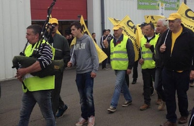 Mark Clements | Protesters march on the showground at SPACE 2015, held in Rennes, France.