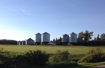 Grain Bins In Field