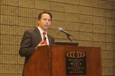 Political consultant Christian Richter speaks at the 2016 International Processing & Production Expo in Atlanta. Photo by Austin Alonzo.