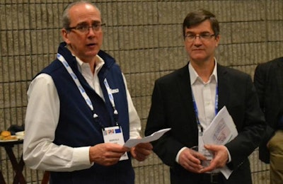 Marcello Lang, director of poultry brands for Elanco, and Dr. Jeff Wilson, president of Novometrix Research, discuss the benefits of the Intestinal Integrity Index at a event held in conjunction with the 2016 IPPE. | Roy Graber