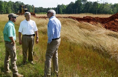 Jim Donald, center, director of the National Poultry Technology Center at Auburn, and Auburn Department of Poultry Science Head Donald Conner, right, discuss construction of the Charles C. Miller Jr. Poultry Research and Education Center in north Auburn with project manager Kevin Porter of Opelika-based JLD Enterprises LLC. | Auburn University