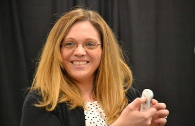 Sheila Jacobi, assistant professor at The Ohio State University, discusses digestibility matters during a presentation at World Pork Expo. | Roy Graber