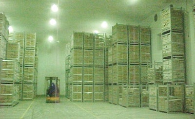 In many cold rooms, high-reach forklift trucks are used to transport and stack processed chickens.