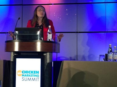 Dr. Karin Hoelzer addressees a packed crowd at the Chicken Marketing Summit on July 11. | Alyssa Conway