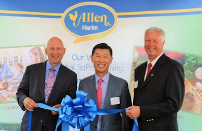 Delaware Governor Jack Markell, left, joins Harim Group Chairman Hong-Kuk Kim, and Allen Harim CEO Joe Moran as they prepare to cut a ribbon celebrating the grand re-opening of the the Harbeson, Delaware, processing plant. | Allen Harim