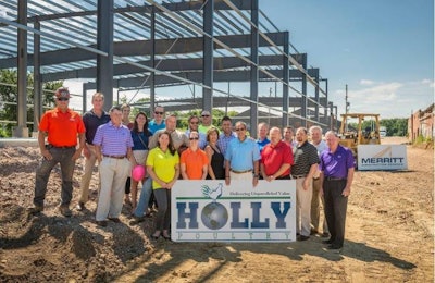 Holly Poultry and Merritt Construction employees break ground on a new further processing plant to be built in Baltimore, Maryland. | Business Wire