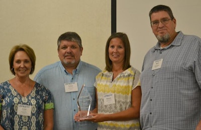 USPOULTRY’s 2016 Clean Water Awards were presented at this year’s Environmental Management Seminar. The winner in the full treatment category is Sanderson Farms’ Kinston, North Carolina, broiler processing plant with (from left) Brenda Flick, manager of environmental; Dwayne Holifield, environmental manager; and Stephanie Shoemaker, manager of environmental services, accepting the award from Brian Kiepper, associate professor, University of Georgia, and a member of the selection committee. | USPOULTRY