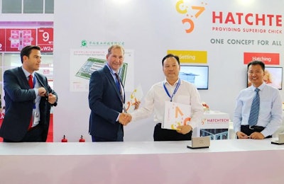 Representatives from HatchTech, Hy-Line and HuaYu celebrate their partnership to construct the world's largest layer hatchery. | HatchTech
