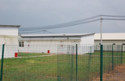 Perimeter fencing and showers are examples of structural biosecurity measures that have been adopted by some poultry farms. | Terrence O'Keefe