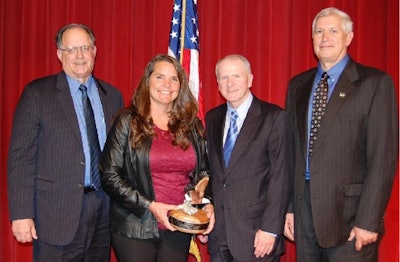 California State Veterinarian Dr. Annette Jones received the USDA APHIS Administrator’s Award at the annual meeting of the United States Animal Health Association. Pictured, from left, are Dr. Jere Dick, Associate APHIS Administrator; Jones; Kevin Shea, APHIS Administrator; and Dr. Jack Shere, APHIS Deputy Administrator. | APHIS
