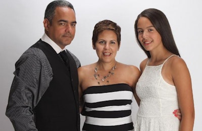 Evelyn Ortiz, Chief Talent Officer at Zoetis, is the company's 2016 Working Mother of the Year. She is pictured here with her husband, Victor and daughter, Rosie. | Zoetis