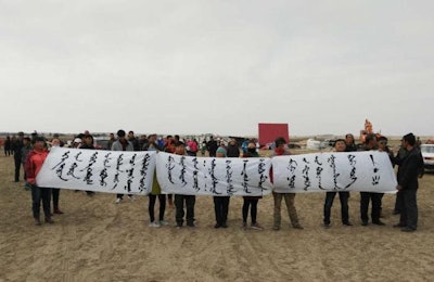 Mongolian herders staged a protest demanding that COFCO halt construction of a pig farm project. | courtesy SMHRIC