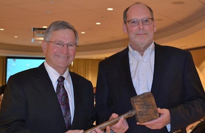2017 chairman of U.S. Poultry & Egg Association, Jerry Moye, right, was presented with the traditional “working man’s gavel” by outgoing chairman, Paul Hill | USPOULTRY.