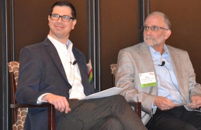 Drs. Matt Salois, left, and Ken Opengart describe the strategy used by animal rights activists as they push companies to commit to sourcing only slower-growing broilers. | Roy Graber