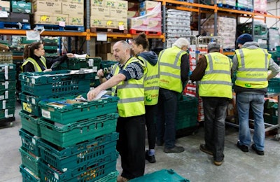 FareShare volunteers work at a facility in Bristol, U.K. Cargill has set up a supply chain for FareShare to distribute chicken to those in need. | Cargill