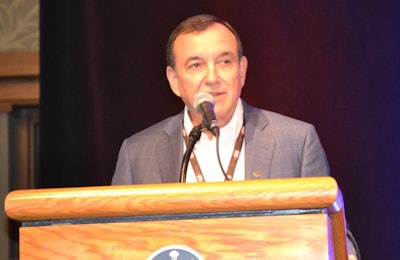 Mike Popowycz, chairman of the National Chicken Council, talks about the changes that have taken place in the United States during the Chicken Marketing Summit on July 17. | Roy Graber