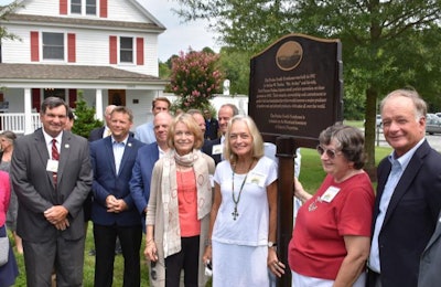 The Perdue family farmhouse, which celebrates its 100th anniversary this year, was officially placed on the Maryland Inventory of Historic Properties by Maryland Gov. Larry Hogan during an August 21 ceremony in Salisbury. From left to right are Joseph Bartenfelder, Maryland secretary of agriculture, Maryland Rep. Carl Anderton, Maryland Gov. Larry Hogan, Anne Oliviero, Beverly Jennings, Sandy Spedden, and Jim Perdue, chairman of Perdue Farms. | Photo courtesy of Perdue Farms